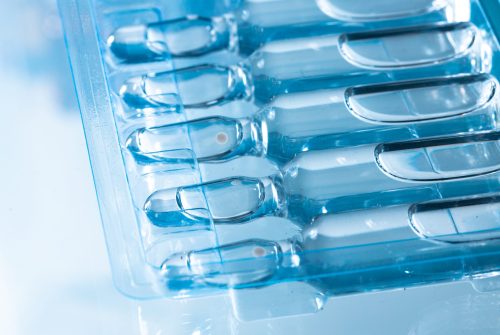 Medical background of plain ampule vials for injections